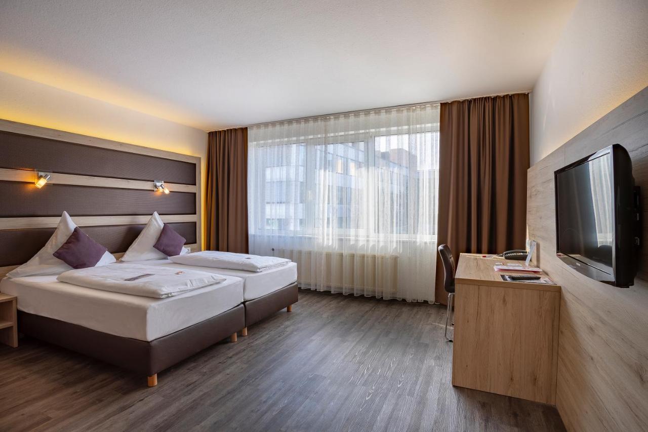 Michel Hotel Frankfurt Airport Рюссельхайм Экстерьер фото