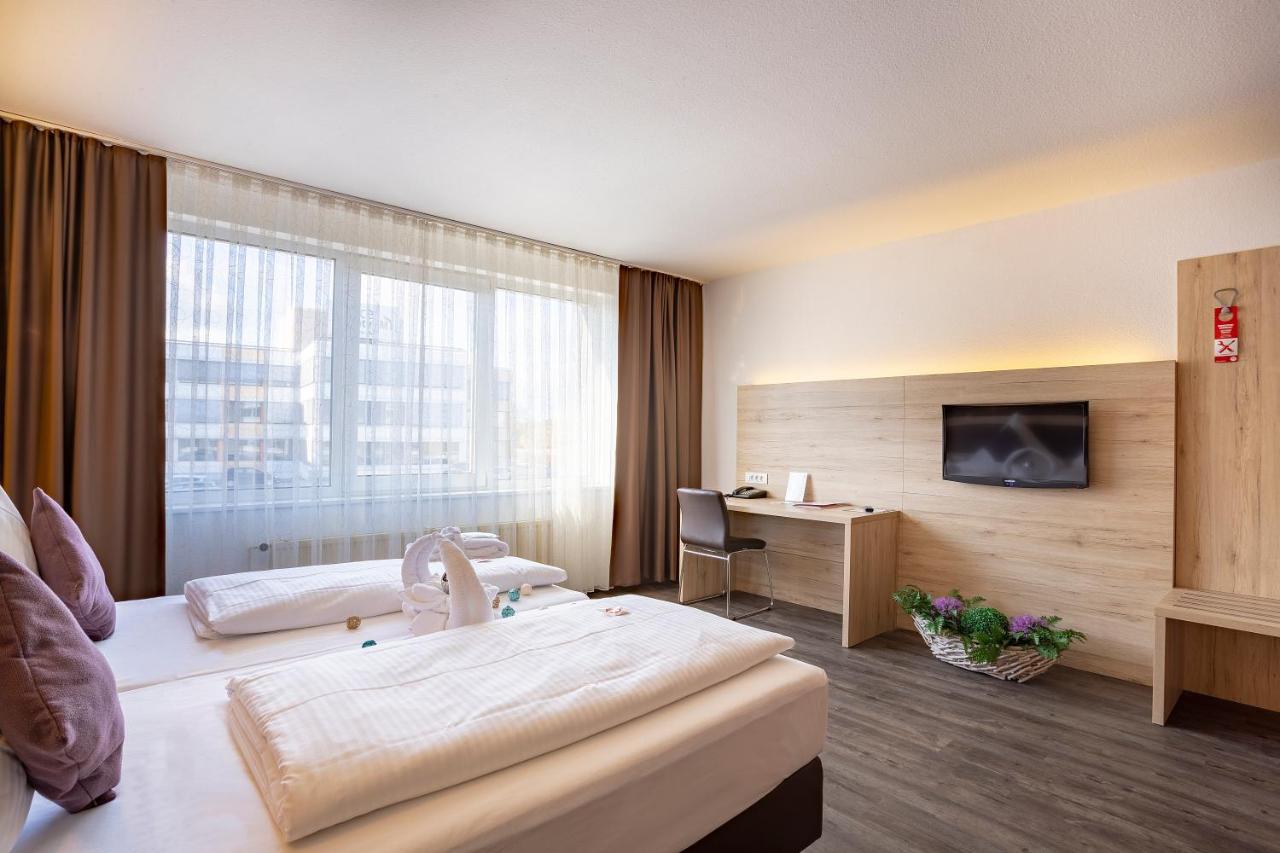 Michel Hotel Frankfurt Airport Рюссельхайм Экстерьер фото