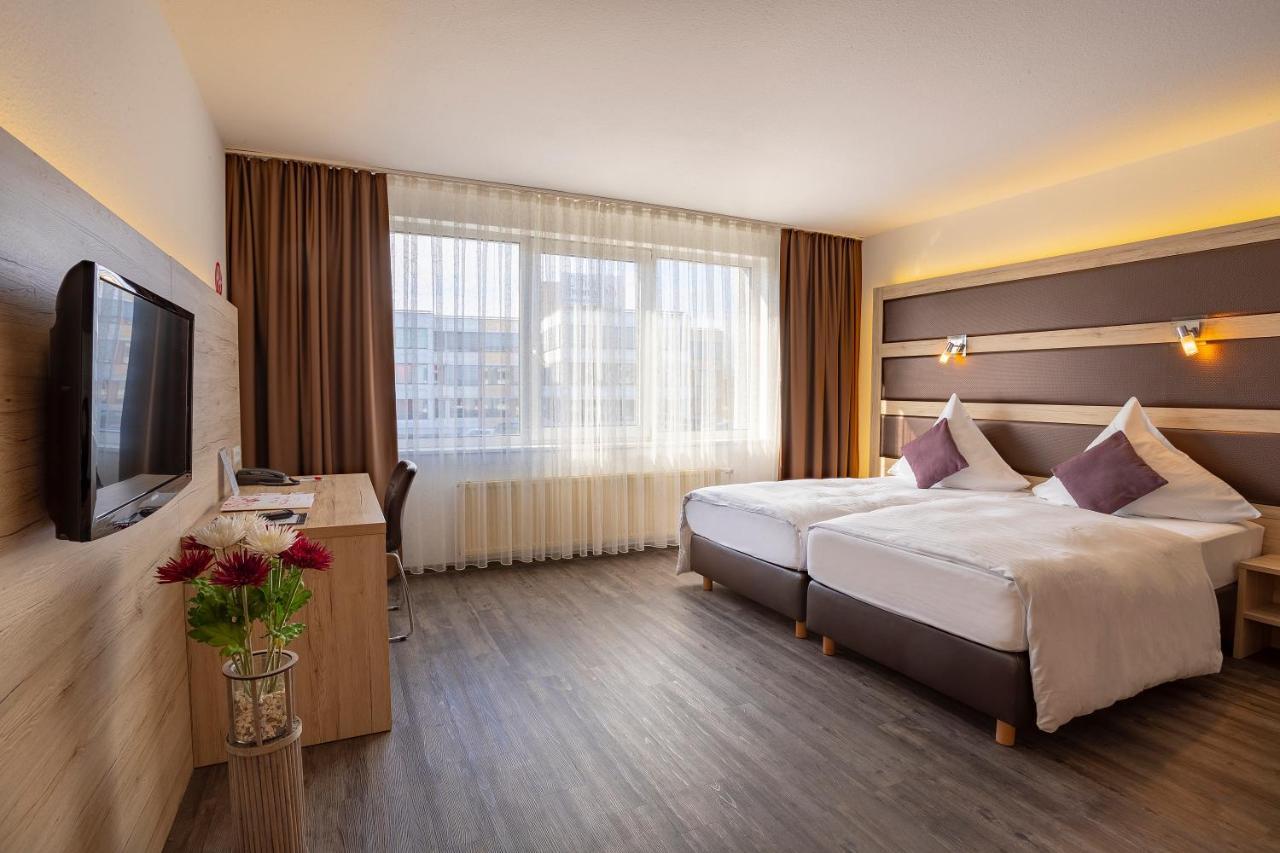 Michel Hotel Frankfurt Airport Рюссельхайм Экстерьер фото