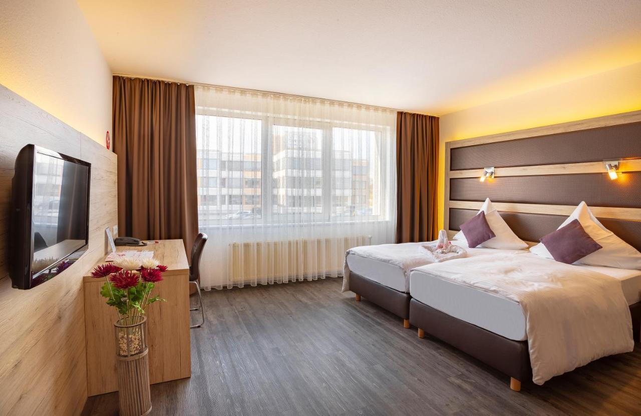 Michel Hotel Frankfurt Airport Рюссельхайм Экстерьер фото